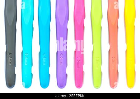 Multicoloured handles of crochet hooks set in different sizes Stock Photo