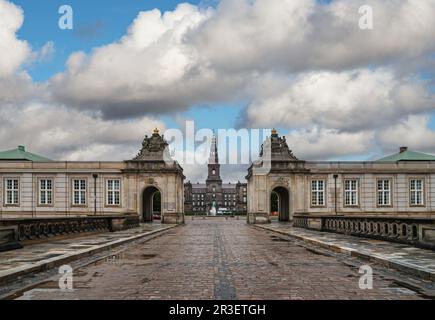 Copenhagen, Denmark - September 14, 2010: From Marmor bridge looking at Western entrance to Christiansborg Slot under thick blue cloudscape. Stock Photo