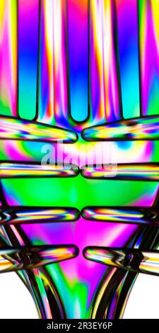 Polarized light through clear plastic utensil abstract Stock Photo