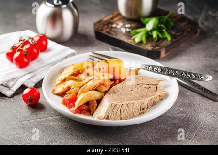 Dinner table with different dishes, set menu for nutritious healthy lunch in restaurant, business lunch Stock Photo