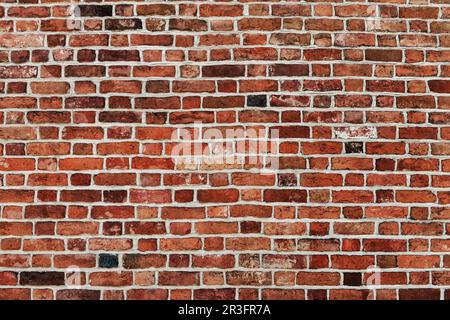 Wall made of red bricks as background Stock Photo