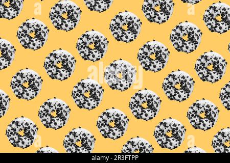 Cookie donut pattern on yellow background Stock Photo