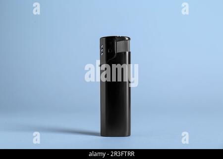 Stylish small pocket lighter on white background Stock Photo