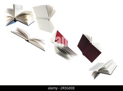 Many hardcover books flying on white background Stock Photo