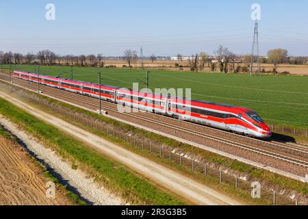 Frecciarossa FS ETR 1000 high speed train of Trenitalia on the line Milan - Bologna near Melegnano in Italy Stock Photo