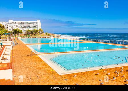 View of Pavilion Public Swimming Pool on Sea Point promenade in Cape Town Stock Photo