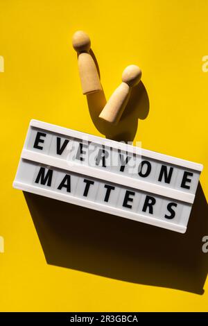 Lightbox with message EVERYONE MATTERS. Motivational Words Quotes Concept. Colorful yellow background. Minimalistic creative con Stock Photo