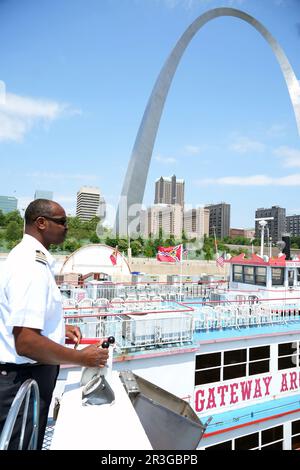 St. Louis, United States. 23rd May, 2023. Riverboat captain Kevin East pilots the Tom Sawyer Riverboat away from its moorings near the Gateway Arch on the Mississippi River in St. Louis on Tuesday, May 23, 2023. East is the first African-American in the state to earn his license to navigate a excursion vessel in 1992. Photo by Bill Greenblatt/UPI Credit: UPI/Alamy Live News Stock Photo