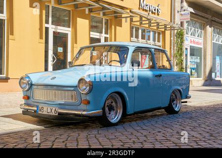 Well preserved car Trabant from GDR production in the old town of Wittenberg in Germany Stock Photo