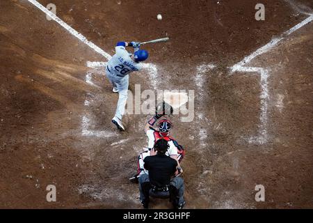 National League's J.D. Martinez, of the Los Angeles Dodgers (28) greets  Sean Murphy, of the Atlanta Braves, left, after Martinez scored during the  MLB All-Star baseball game against the American League in