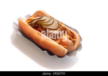 hot dog with ketchup, mustard, fried onions and pickles Stock Photo