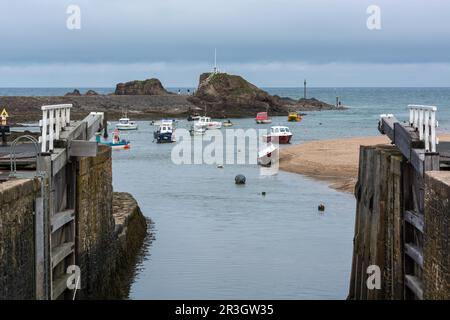 BUDE, CORNWALL/UK - AUGUST 15 : Boats in the harbour at Bude on August 15, 2013. Unidentified people Stock Photo