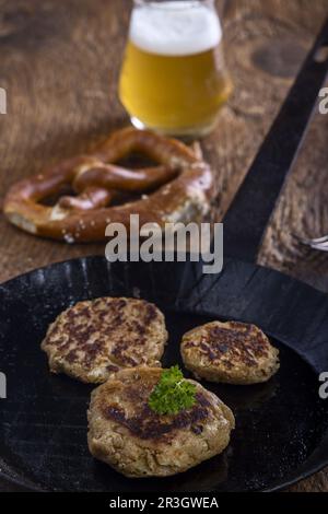 Austrian cheese dumplings in the pan Stock Photo