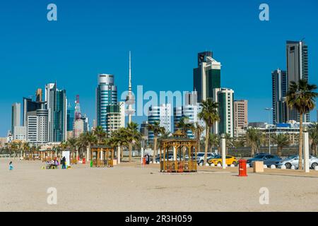 Shuwaikh beach before the skyline of Kuwait City, Kuwait Stock Photo