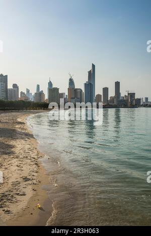 Skyline of Kuwait City at sunset Stock Photo - Alamy