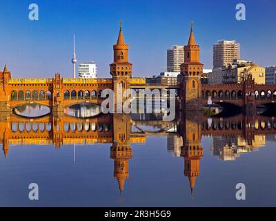 Oberbaum bridge over the Spree river with yellow subway, Berlin, Germany, Europe Stock Photo