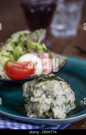 Rustic spinach dumpling with salad Stock Photo