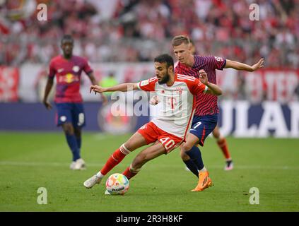 Noussair Mazraoui FC Bayern Muenchen FCB (40) vs Dani Olmo (07) RasenBallsport Leipzig RBL Allianz Arena, Munich, Bavaria, Germany Stock Photo