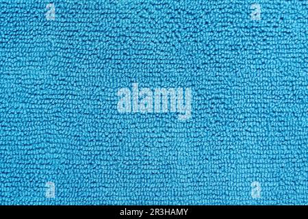 Micro fiber material cloth with close up shot. Fabric texture background. Fabric blue pattern. Cleaning service Stock Photo
