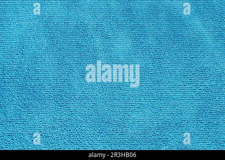 Micro fiber material cloth with close up shot. Fabric texture background. Fabric blue pattern. Cleaning service Stock Photo