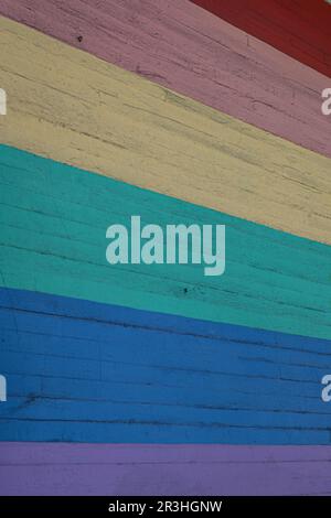 Rainbow flag concrete wall murales.  Stock Photo