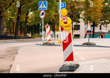Road works signs for construction works in the town street Stock Photo