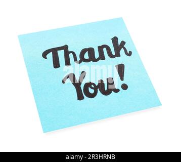 Light blue paper note with phrase Thank You, calculator and notebook on ...