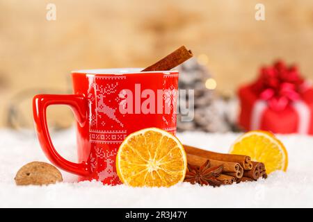 Mulled wine or tea with decoration for Christmas in winter Stock Photo