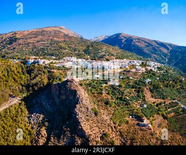 Lanjaron Castle or Castillo de los Moros aerial panoramic view, it is a small medieval fortress in Lanjaron town in the Alpujarras area in the provinc Stock Photo