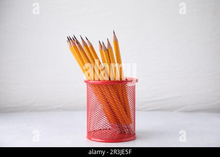 Many sharp pencils in pencil case on white background Stock Photo - Alamy