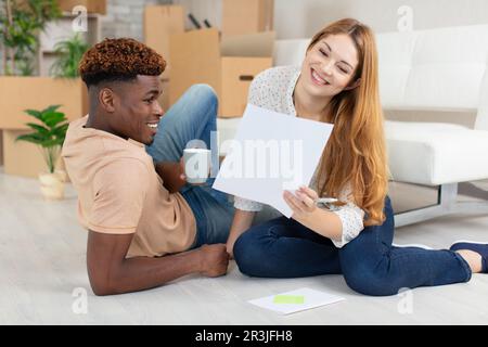 african couple having fun use online site Stock Photo