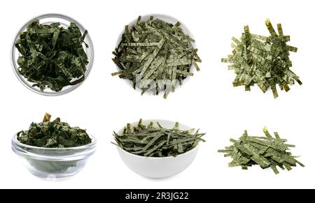 Set with tasty chopped crispy nori sheets on white background Stock Photo