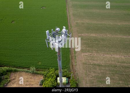 5G Cell Towers on countryside rural background in Italy Stock Photo