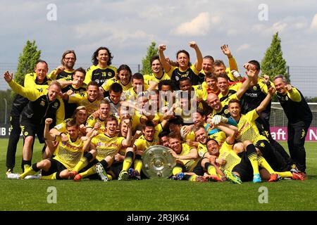 Borussia Dortmund on the way to the German championship after 11 years. ARCHIVE PHOTO; Team, Team, Team photo, Team photo with championship trophy, cup, trophy. Gesture image, frame, posed, football 1st Bundesliga, matchday 34, Borussia Dortmund (DO) - SC Freiburg (FR) 4: 0, on May 8th, 2012 in Dortmund/Germany, POOL PHOTO. ? Stock Photo