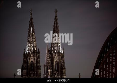 Saving energy, Cologne Cathedral with Hohenzollern Bridge dimly lit, Cologne, Germany, Europe Stock Photo