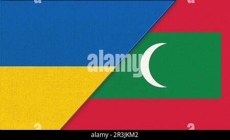 Flag of Ukraine and Maldives - 3D illustration. Two Flags Together. National Symbols of Ukraine and Stock Photo