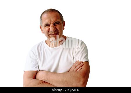 Portrait middle-aged man grimacing, with sly expression on face, isolated on white background Stock Photo