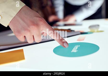 Project manager discussing new strategy of company with team, working on startup product over modern office interior design Stock Photo