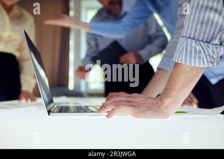 Team of developers creating new Website design, working on software over modern office design interior. IT company. Concept of coding technologies Stock Photo