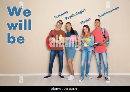 Choice of profession. Different occupations written over teenagers and inscription We Will Be. Children near beige wall Stock Photo