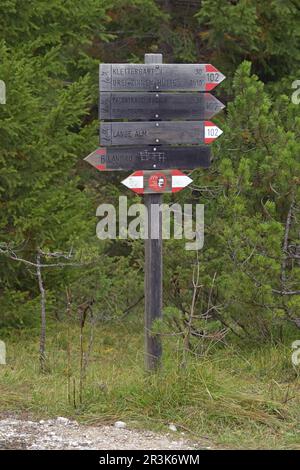 Signposting of hiking trails in the Dolomites Stock Photo