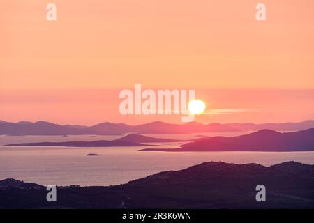 Sunset going down over the small islands in croatia europe Stock Photo