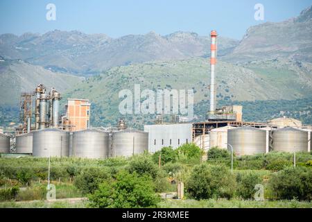 Image of industrial factory in countryside at Trapani, Sicily. Stock Photo