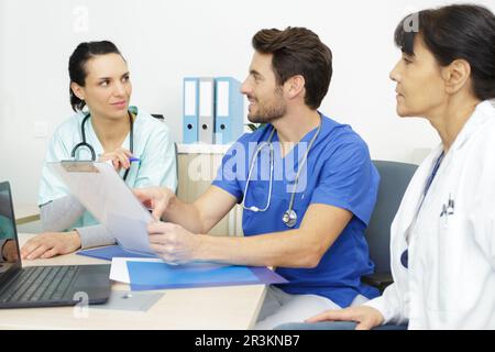 medical doctors discussing a case Stock Photo