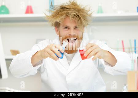 crazy scientist got the great idea in laboratory Stock Photo