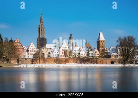 Panorama of City Ulm in winter with blue sky and snow. Ulmer Minster and river danube Stock Photo