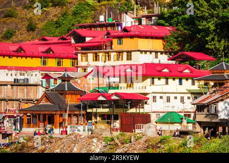 MANIKARAN, INDIA - OCTOBER 02, 2019: Colorful local houses in Manikaran village in Parvati valley, Himachal Pradesh state in India Stock Photo