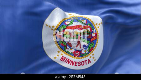 The US state flag of Minnesota waving in the wind Stock Photo
