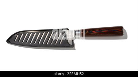 Large kitchen knife in a plastic sheath on a white isolated background Stock Photo