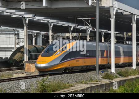 Bandung, Indonesia. 24th May, 2023. A bullet train bound for Jakarta station is seen during a trials at the Tegalluar station in Bandung, West Java, Indonesia on May 24, 2023. PT Kereta Api Indonesia China (KCIC) conducted a Hot Sliding Test on The CIT train from Tegalluar Station, Bandung Regency to Halim Jakarta Station, has an average maximum speed of 180 kilometers per hour. (Photo by Dimas Rachmatsyah/INA Photo Agency/Sipa USA) Credit: Sipa USA/Alamy Live News Stock Photo